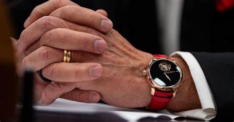 why does mr wonderful wear two watches